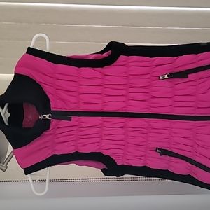 Calvin Klein .medium size sleeveless winter vest pink black.Too tight for me